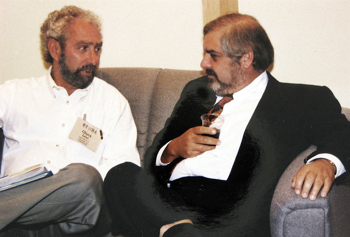 Chuck Levi (left) with Marvin R. Shanken at an early 1990s cigar trade show.