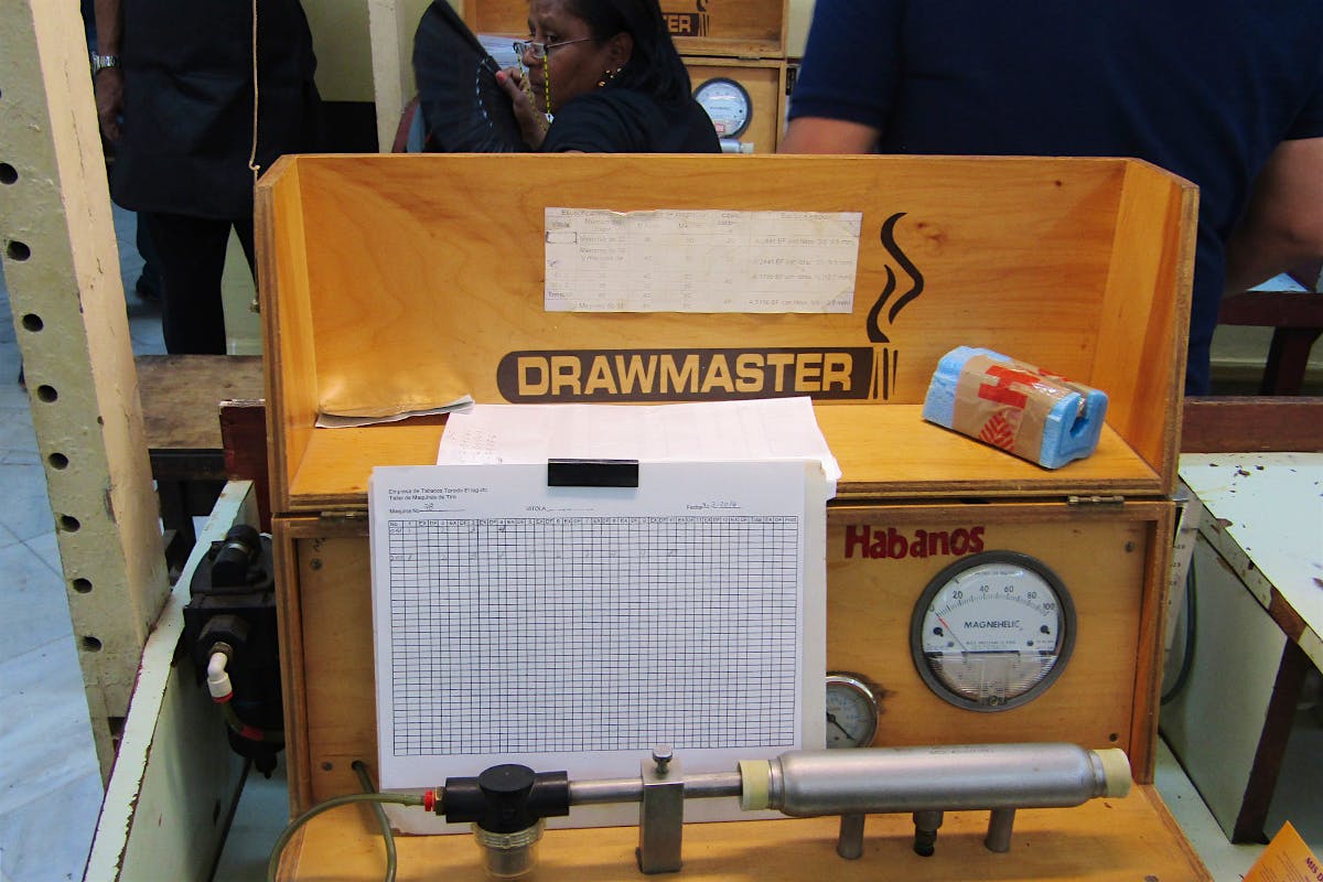 The Drawmaster machine inside one of the quality control rooms aims to weed out plugged cigars.