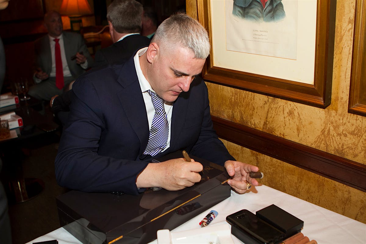 >A humidor filled with cigars was signed by Fernandez and auctioned during a raffle.