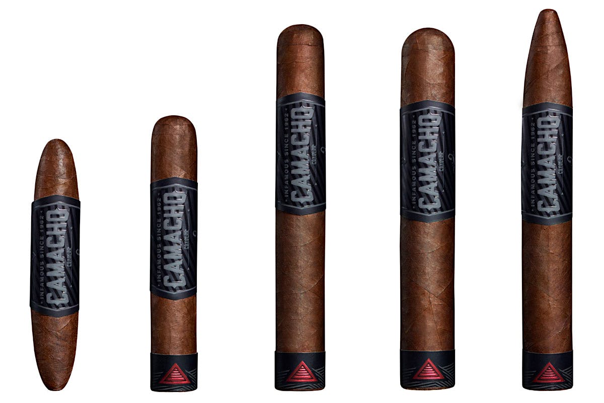 Each size of Camacho Coyolar ships in 25-count grey and black lacquered boxes.