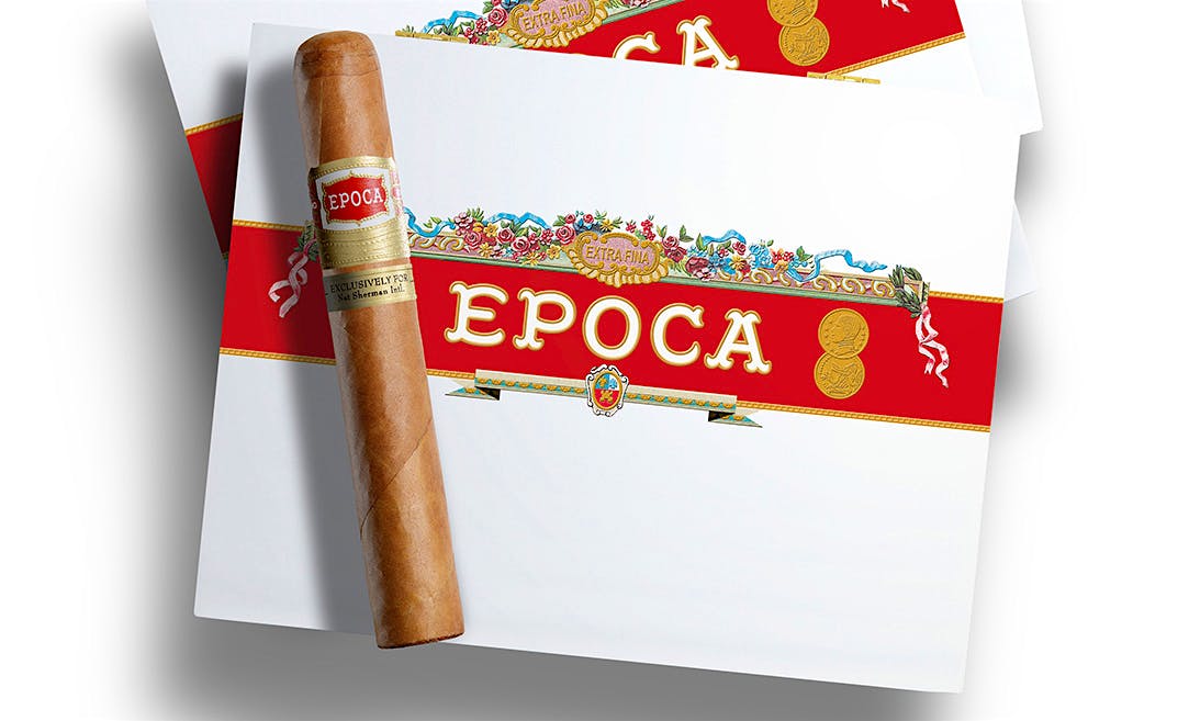 The new Epoca box is mainly white, save for a red band with the Epoca name spanning the center with a floral treatment above it.
