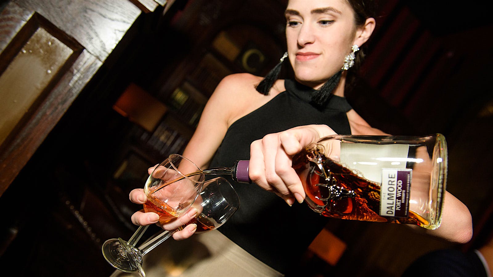 A representative from The Dalmore Scotch pours the Port Wood Reserve.