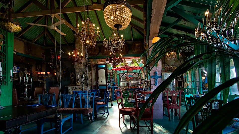 The interior décor of Cape to Cuba, an eclectic mix of colorful artifacts, creates a captivating roadside attraction.