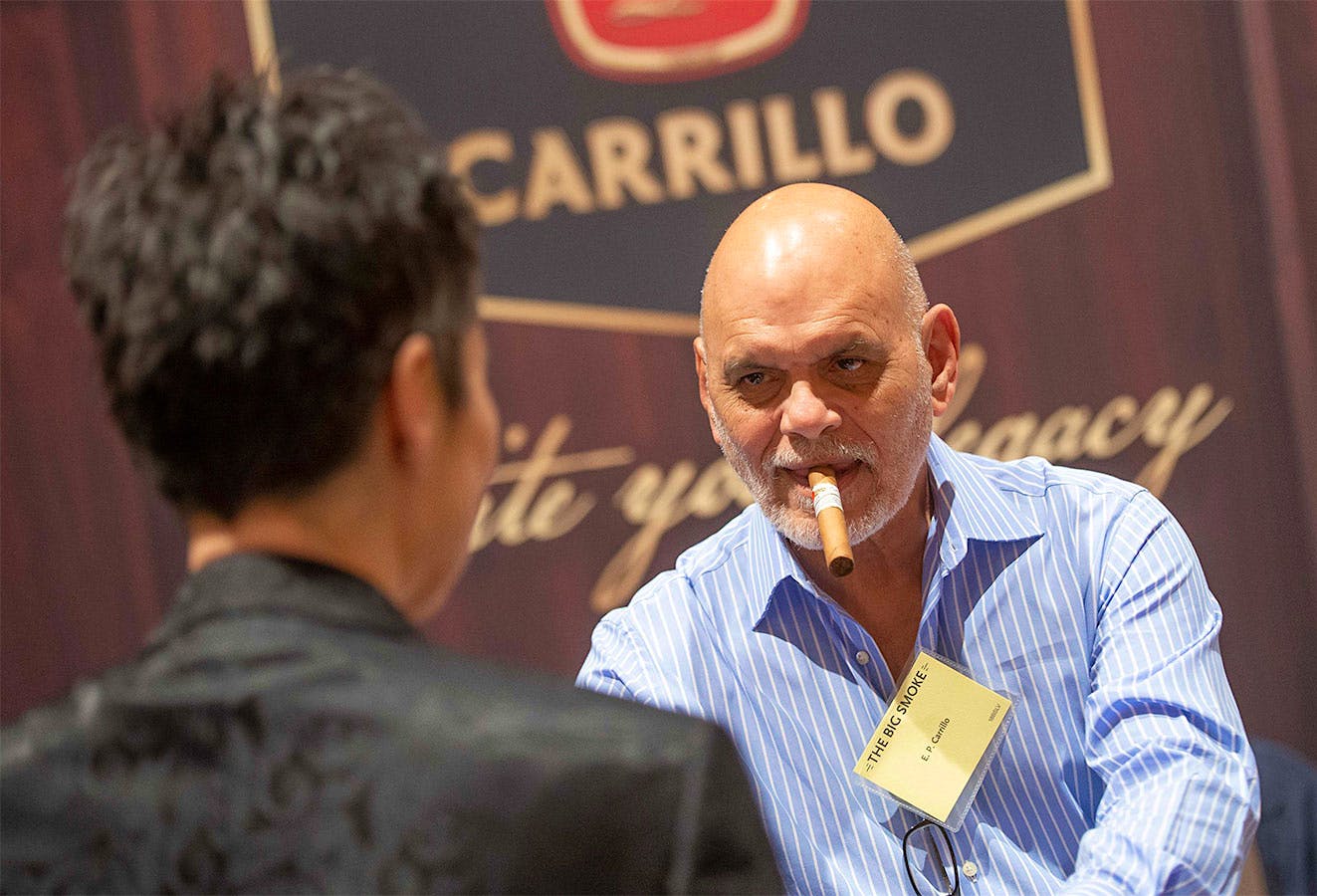 Cigarmaker Ernesto Perez-Carrillo greets fans at the E.P. Carrillo booth.