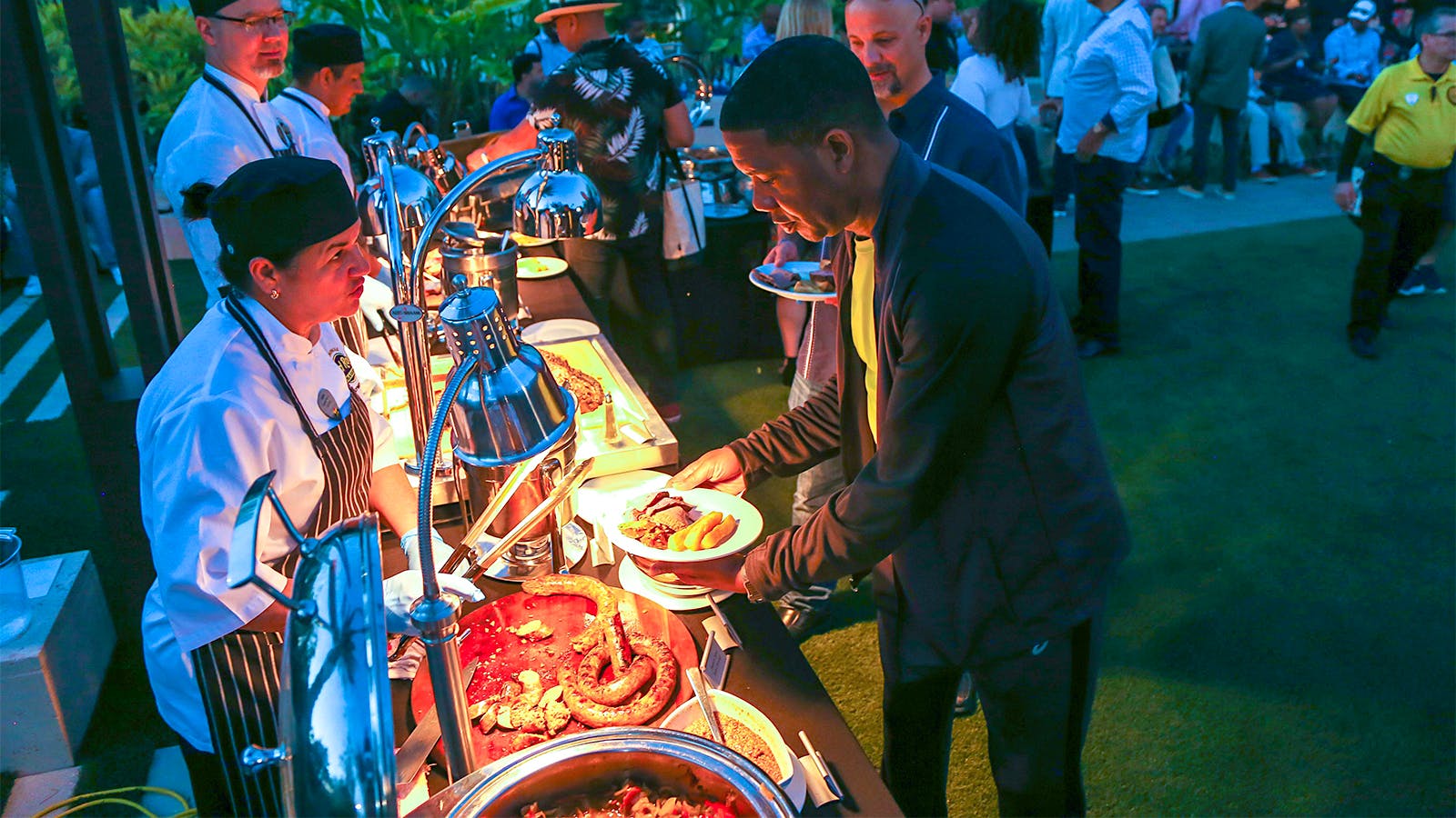 The food was as plentiful as the cigars and drinks, with sausages and flank steaks roasting on open-fire grills all night while servers at carving stations piled up as much beef as a plate could hold.
