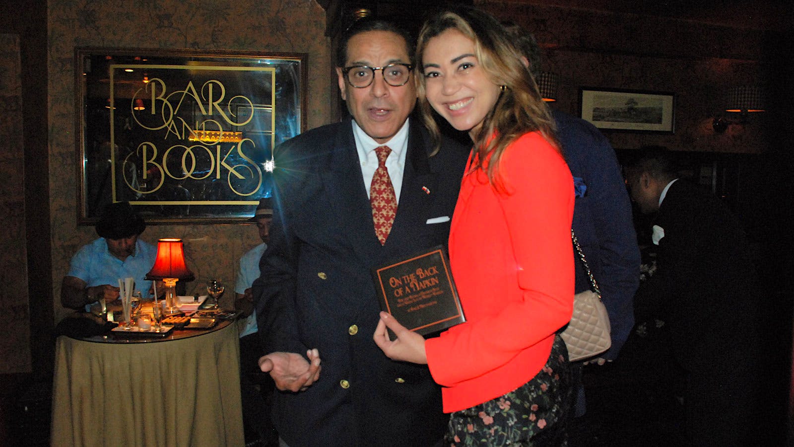Bar and Books owner Raju S. Mirchandani with guest Elena Cavalcante.