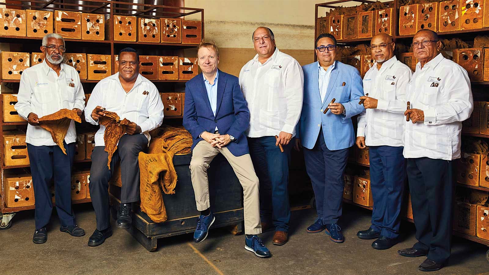 These stewards of Tabacalera de Garcia ensure quality and consistency for the brands of Altadis. They stand in front of blend boxes on the factory floor. From left to right: Nestor Rodriguez, Pedro Ventura, Javier Estades, Javier Elmudesi, Rafael Nodal, Carlos Travieso and Victor Avila.