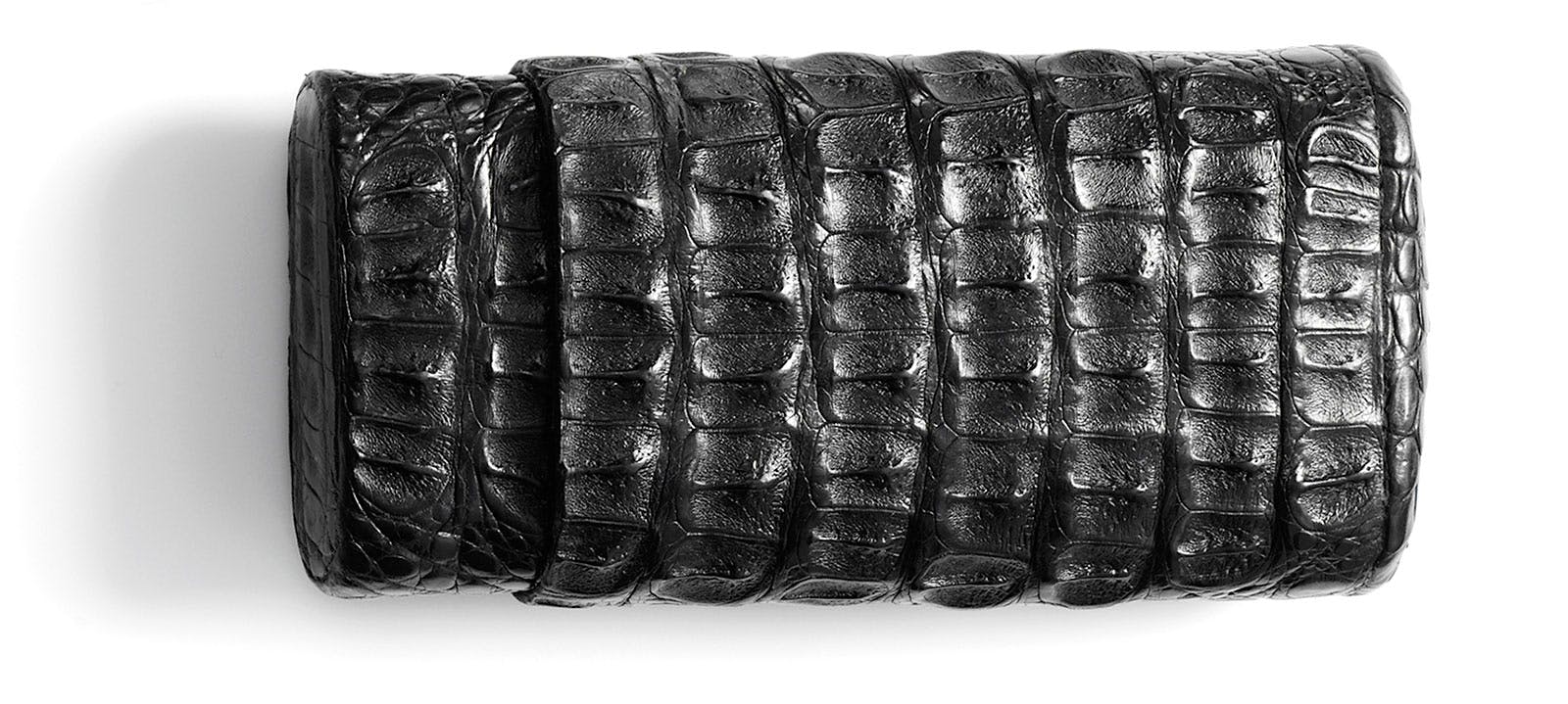 Brizard and Co.’s Black Caiman Crocodile 3 Cigar Case has a fully lined, Spanish cedar interior that helps cigars maintain proper humidity while traveling.