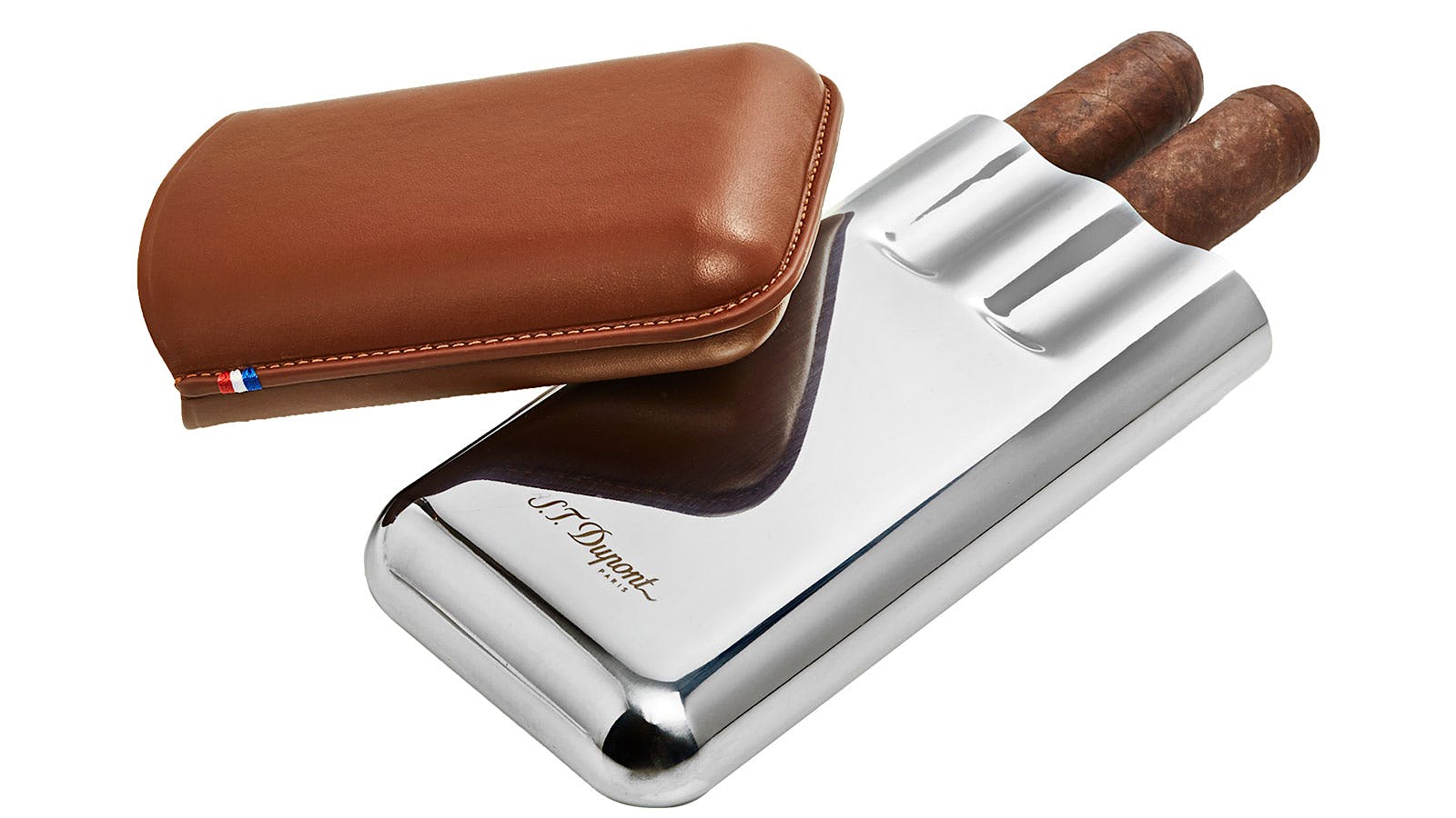 Visually striking and durable, S.T. Dupont’s Triple Cigar Case is made from rich brown calfskin and metal.
