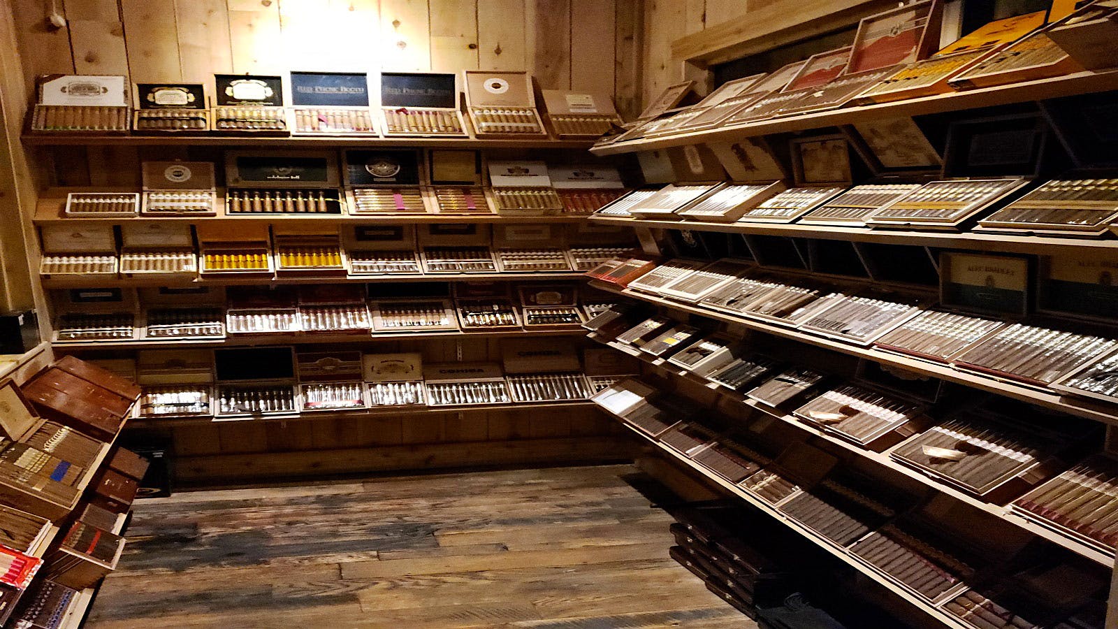 The humidor is well-stocked with more than 100 different cigars.