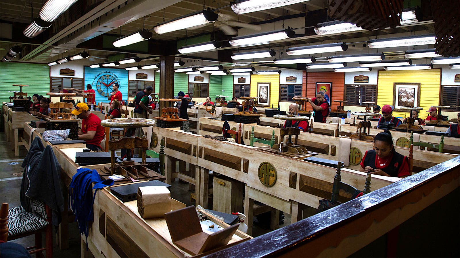 The rolling gallery for all Don Carlos cigars. Look closely behind the worker turning the vice and you’ll see a portrait of the late Carlos Fuente Sr., watching over his production floor.