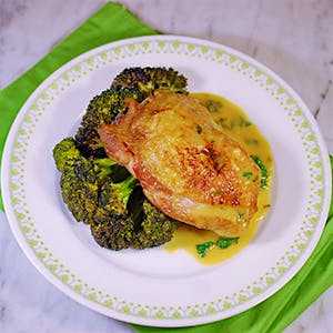 Roasted Chicken Thighs and Broccoli With Lemon-Herb Sauce