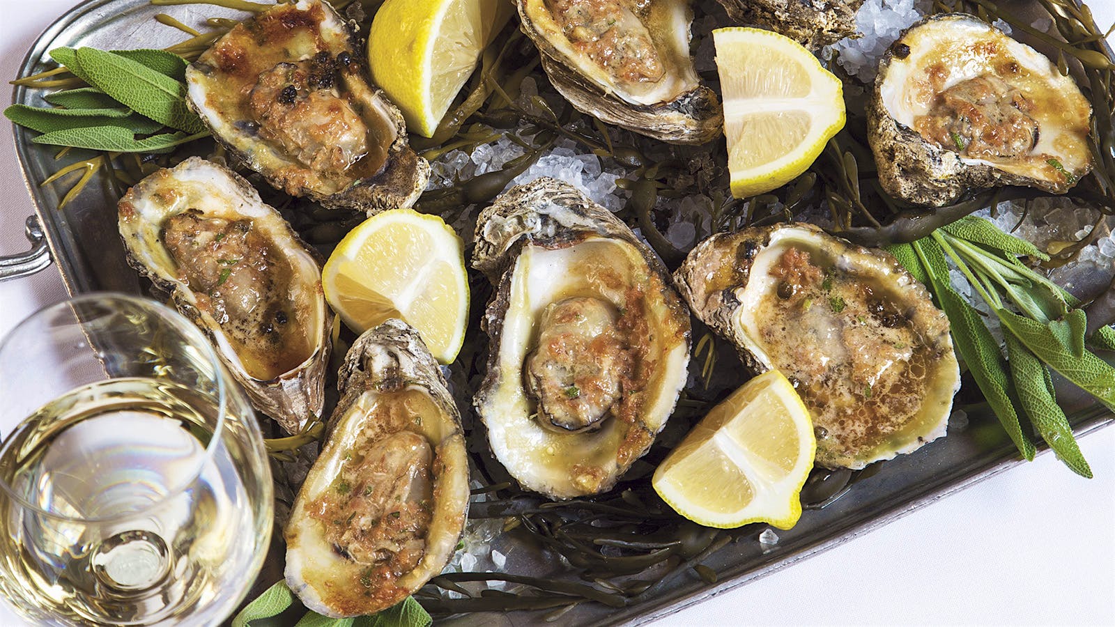 Dining Tip Emeril's Festive Grilled Oysters With Country Ham