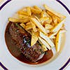 Steak frites with caramelized shallots and bone marrow jus
