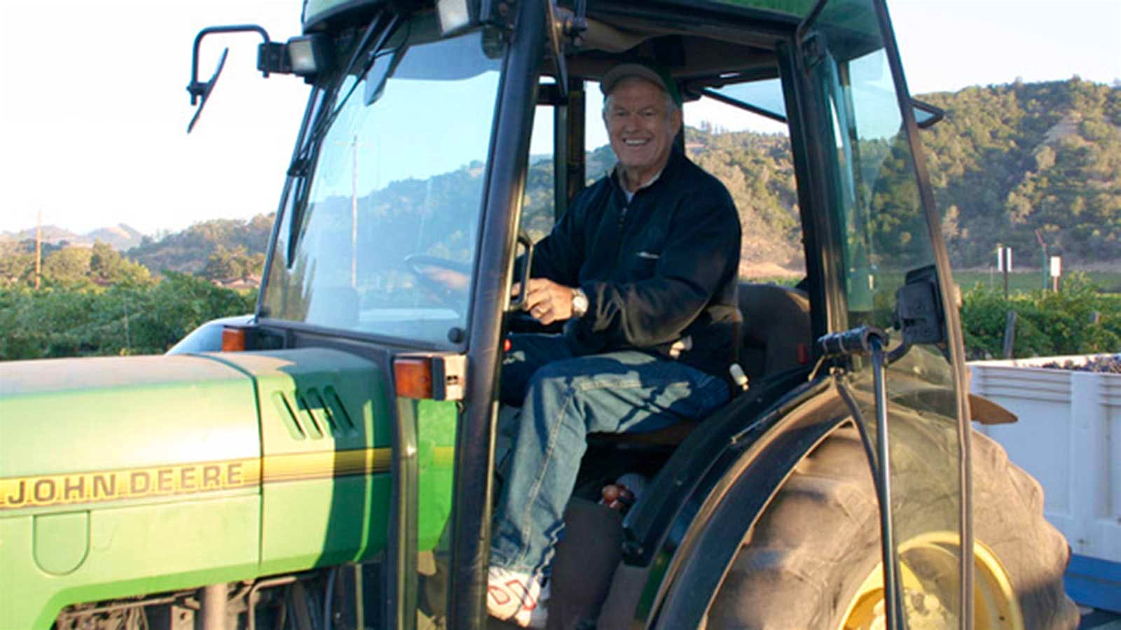 Dick Vermeil on a tractor