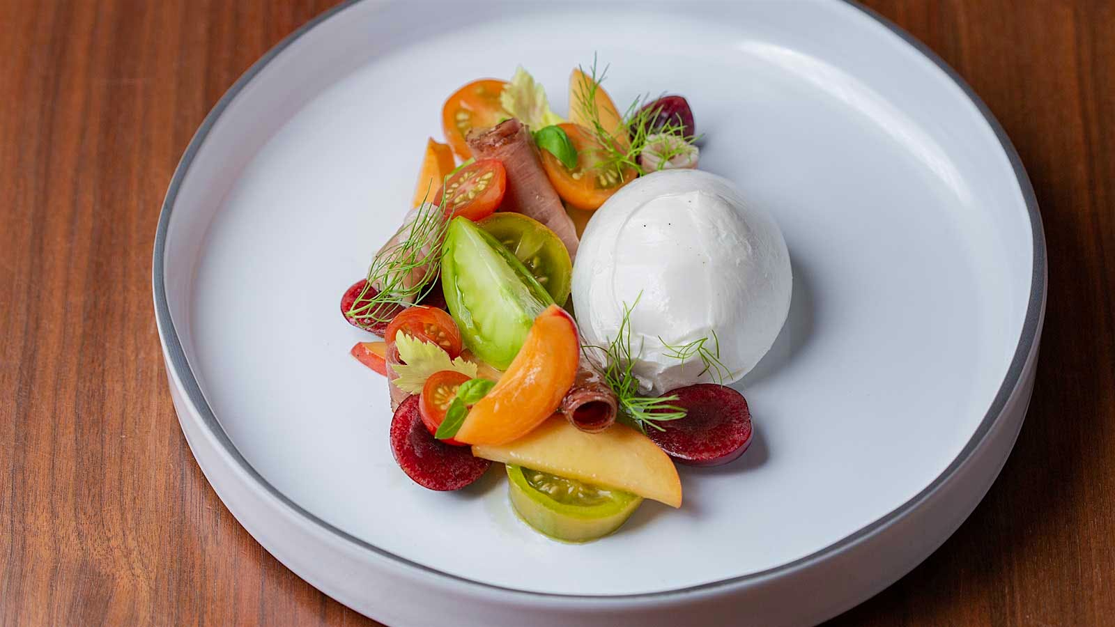 Burrata with cherry tomato and pickled cherry