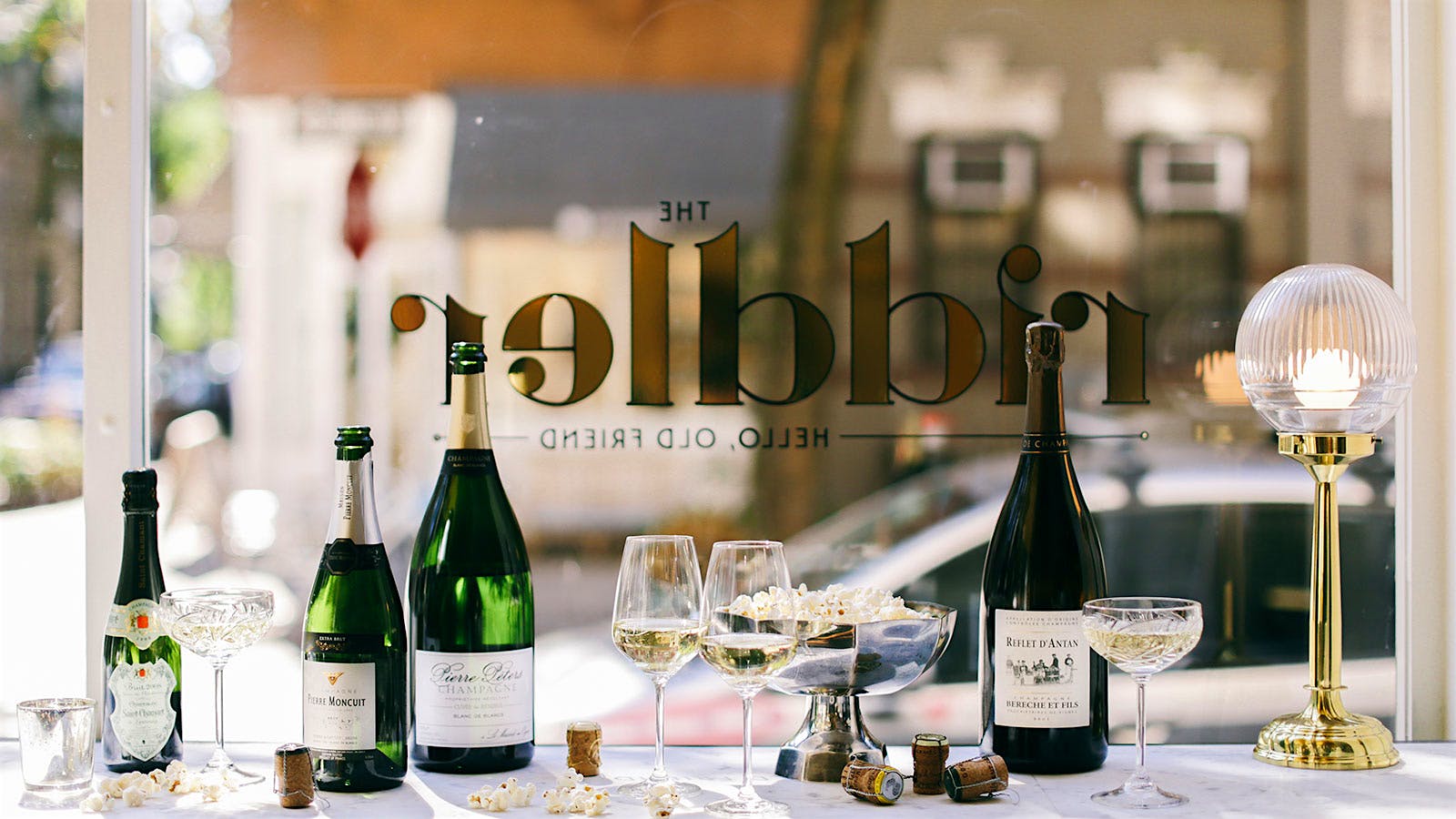 Champagne and glasses on the windowsill at the Riddler