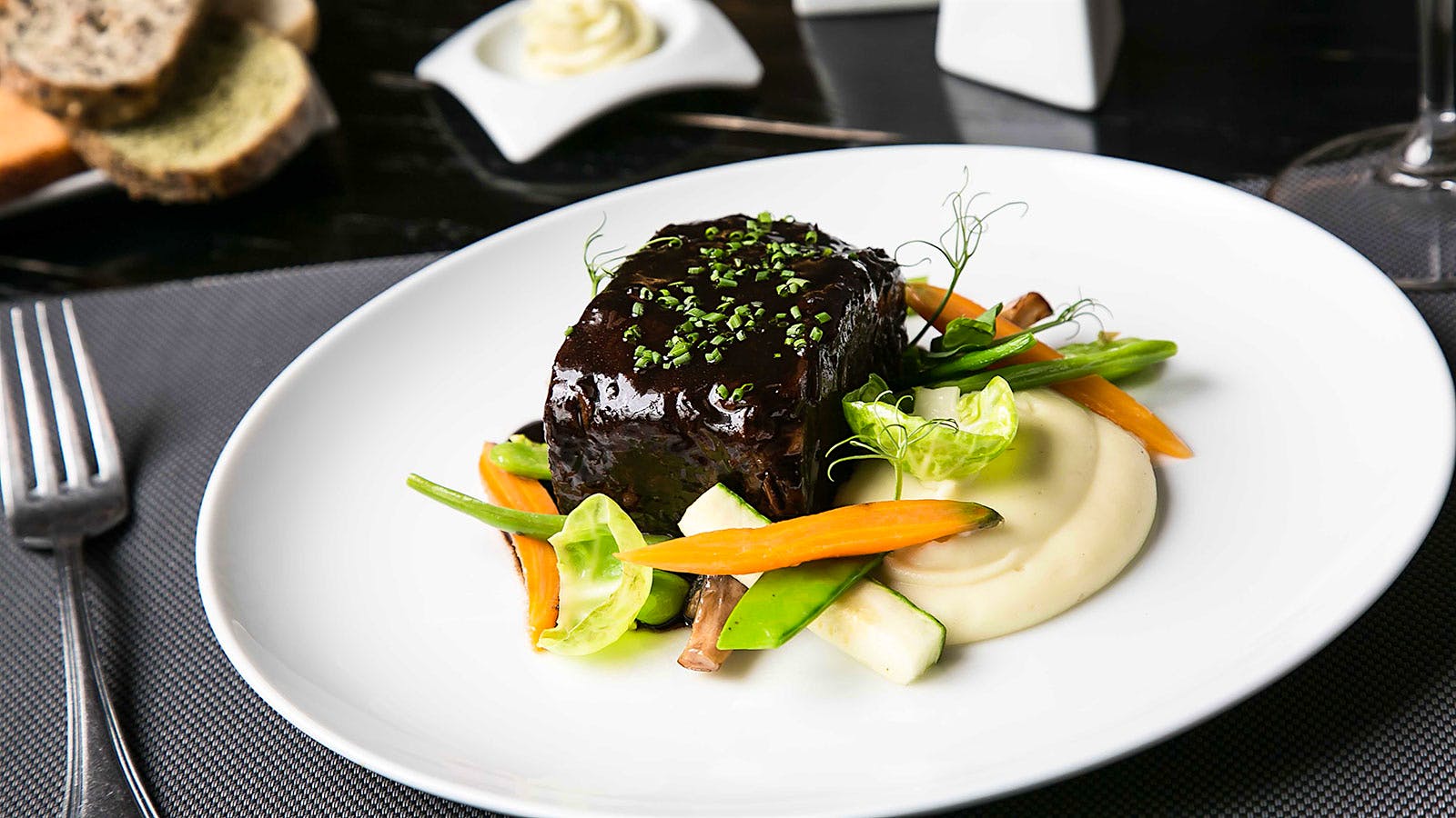 Short rib, mashed potato and vegetables at Eloise Chic Cuisine