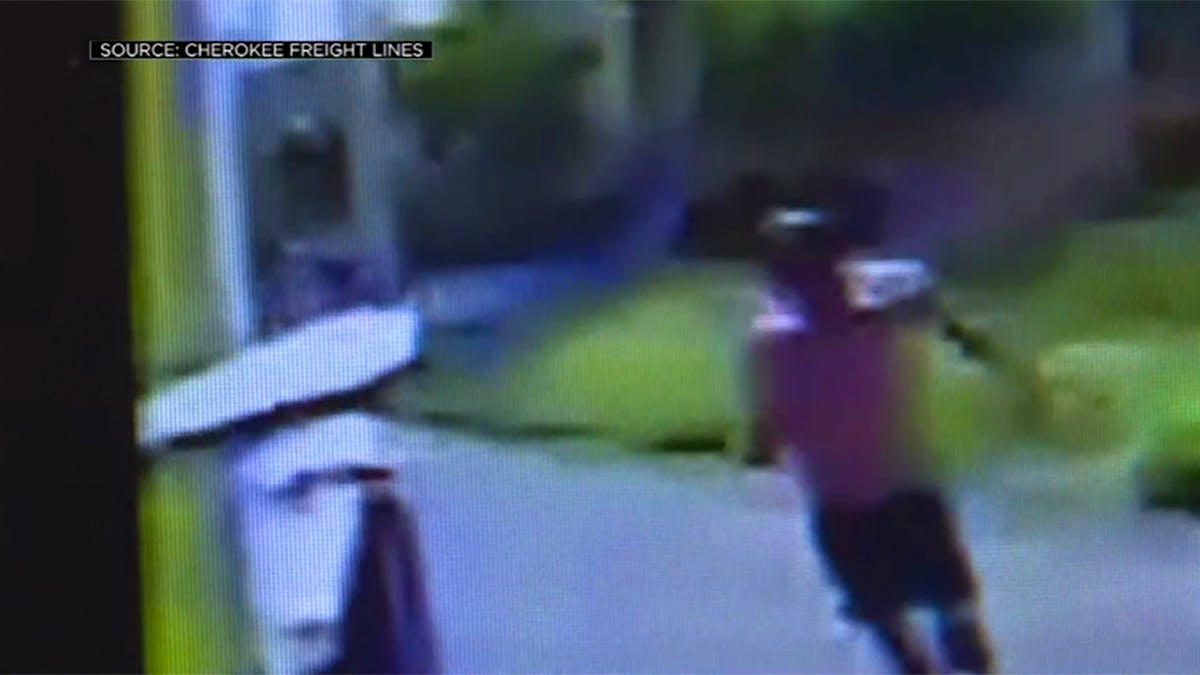 Man chasing wine truck