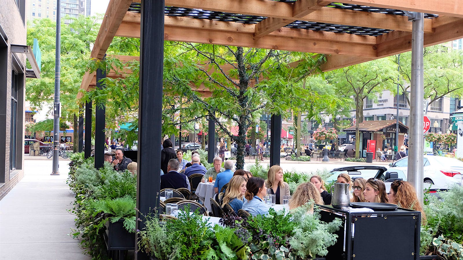 Diners on Maple & Ash’s patio