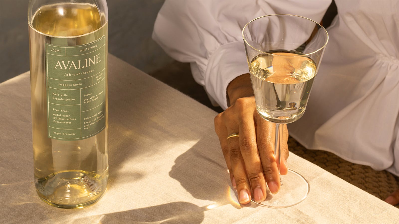 Avaline wine bottle and glass