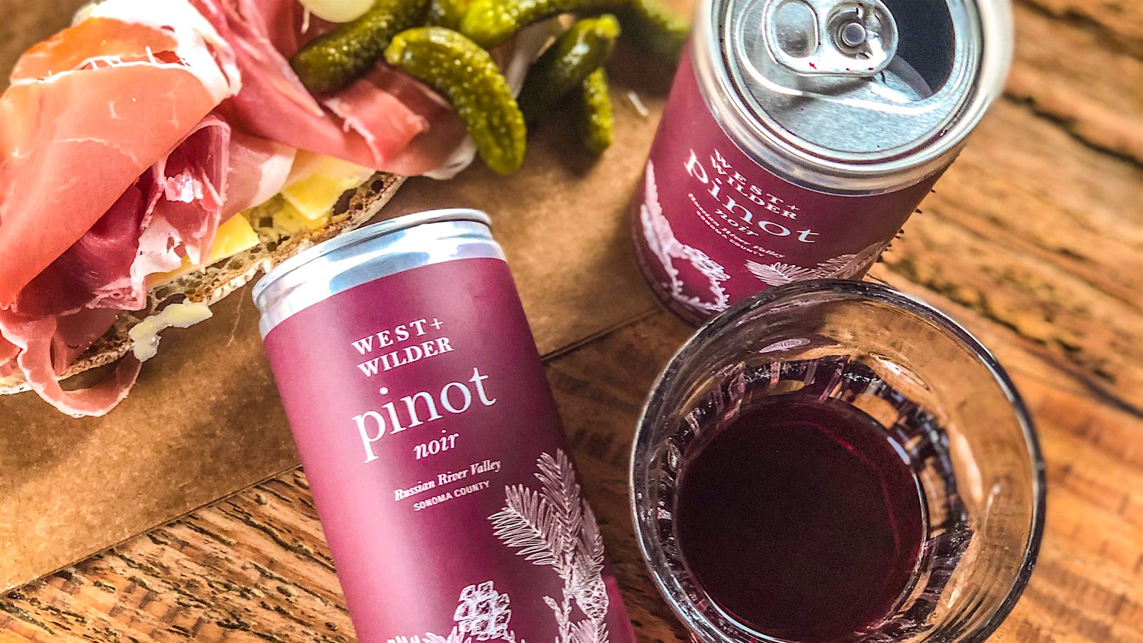 West + Wilder Pinot Noir cans and charcuteries board