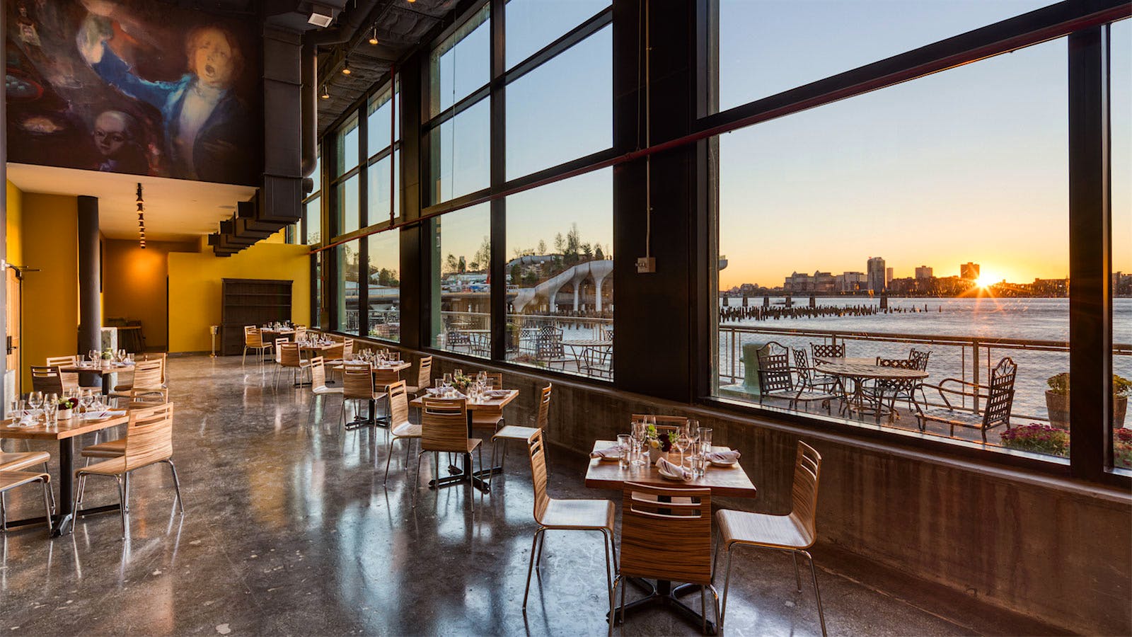 The indoor dining room overlooking the outdoor space at City Winery in New York