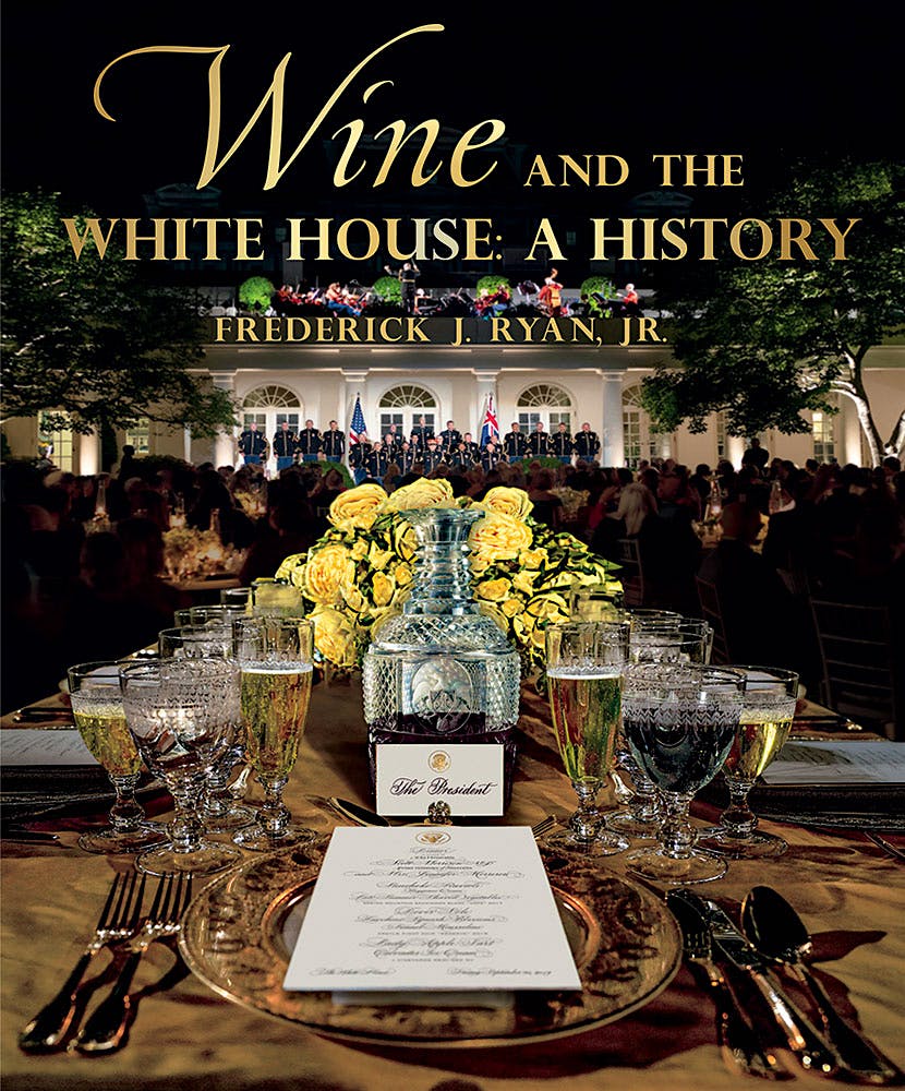 The front cover of the book shows an engraved wine decanter given to President James Madison in 1816.