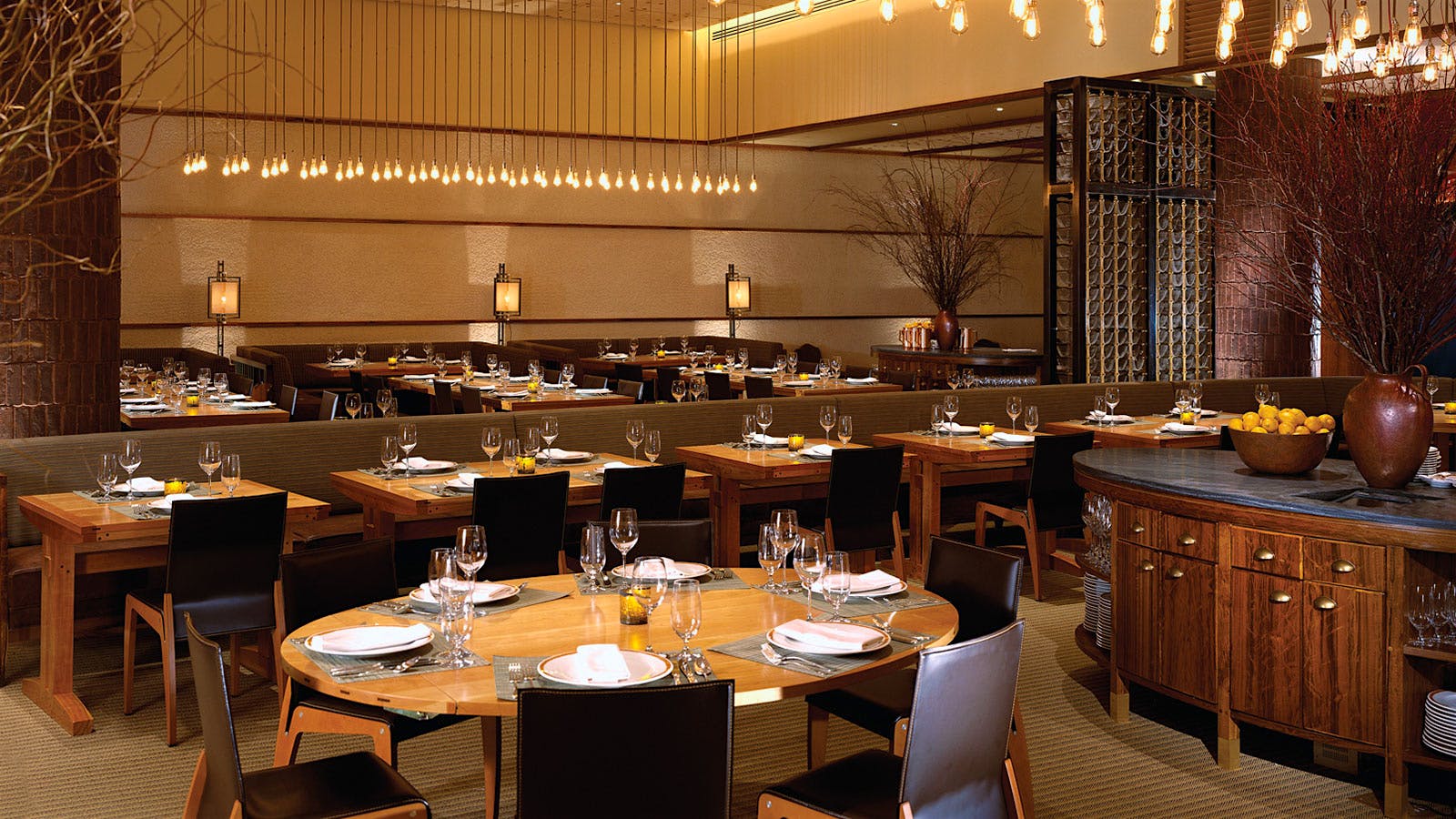 Tables set in the dining room at Craftsteak