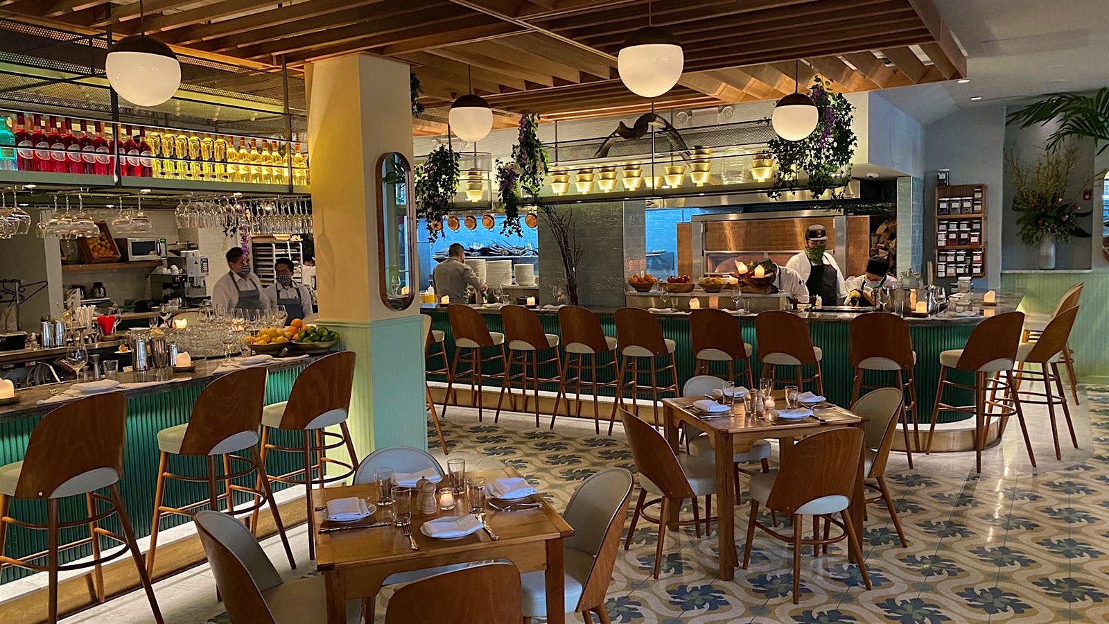 Interior dining-room shot with view of open kitchen at Dagon