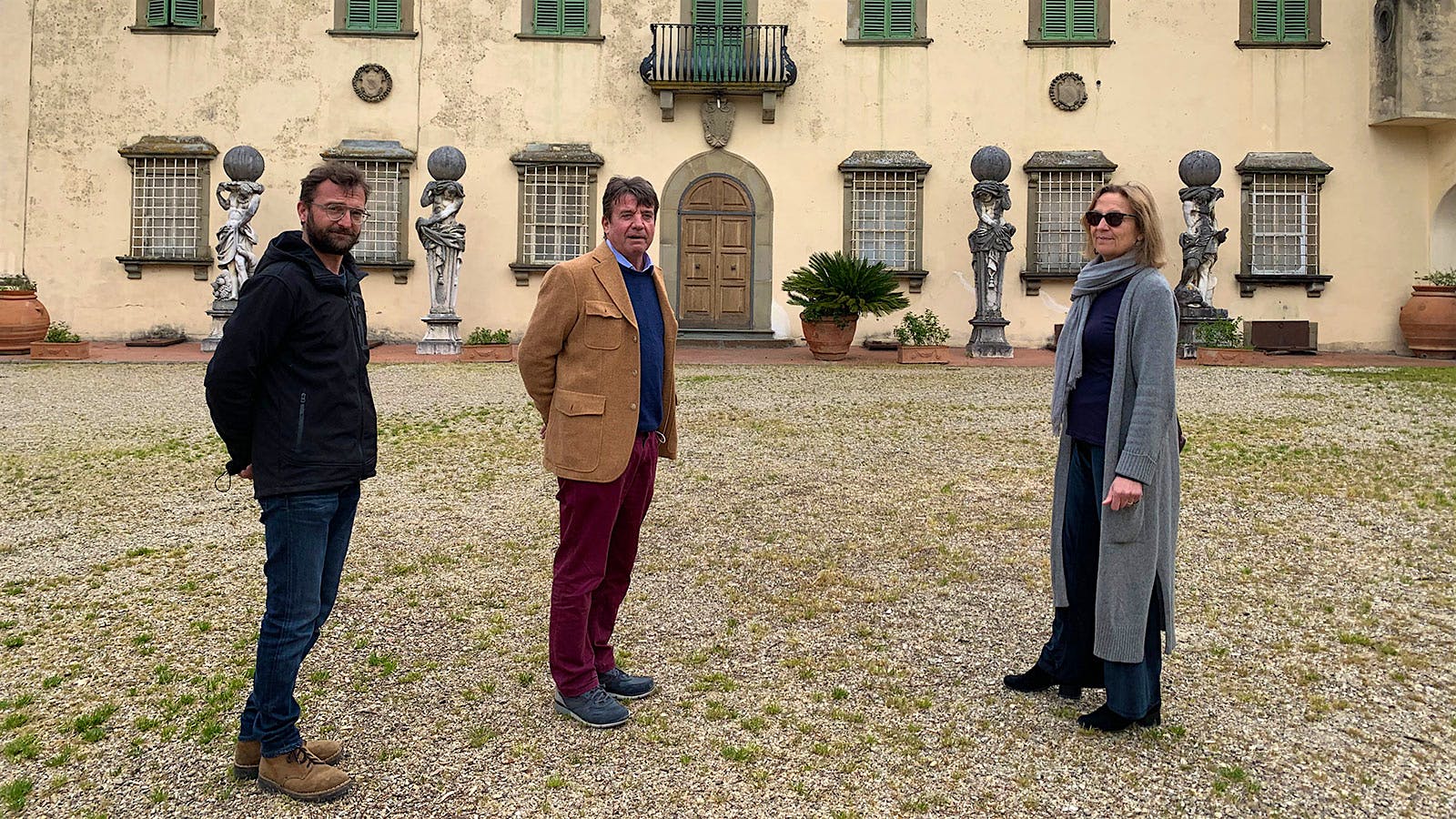 Gaddo, Filippo and Beatrice Contini Bonacossi in front of Capezzana's 15th-century villa.