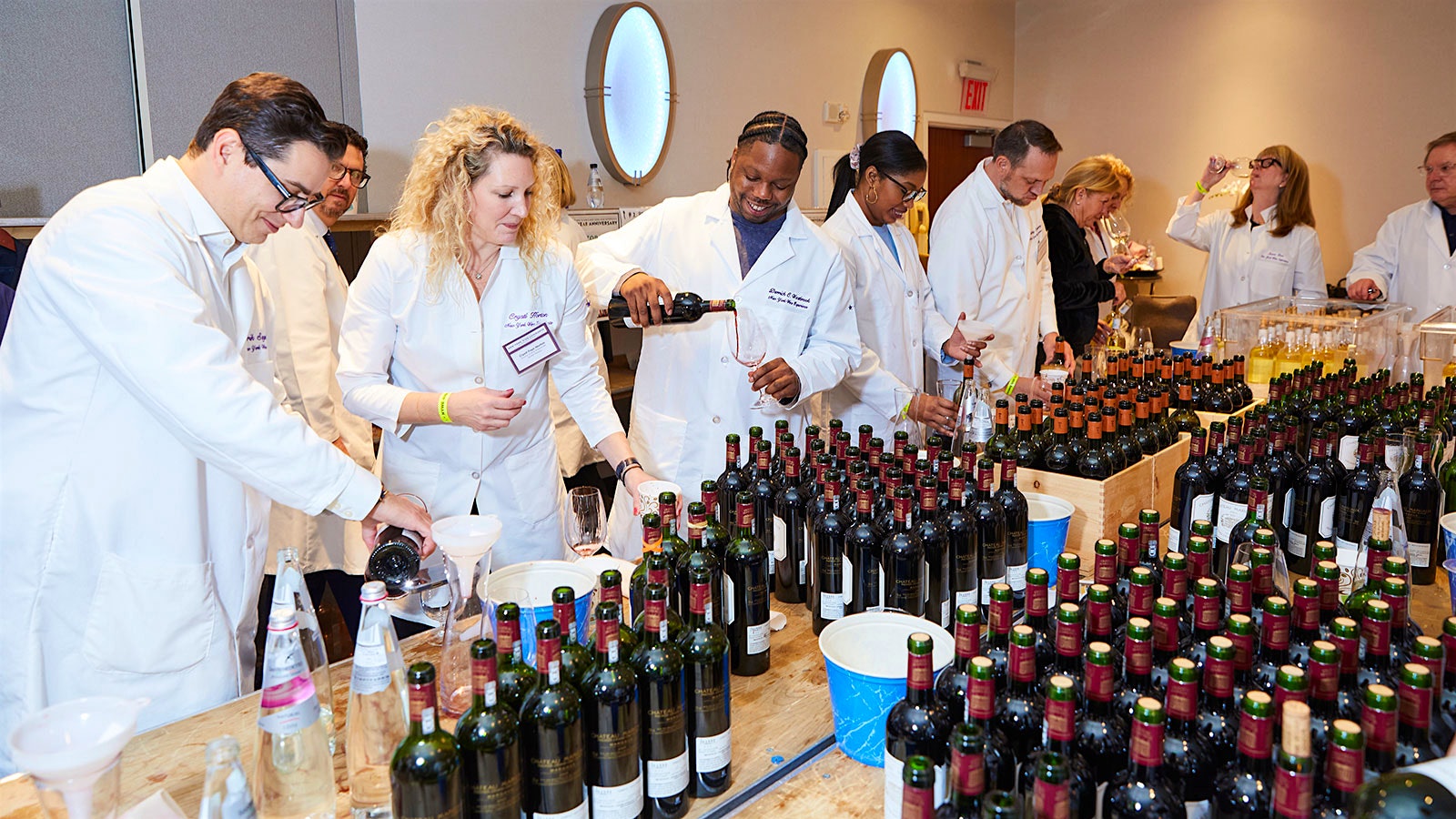  Sommeliers preparing and checking bottles for 2021 New York Wine Experience 