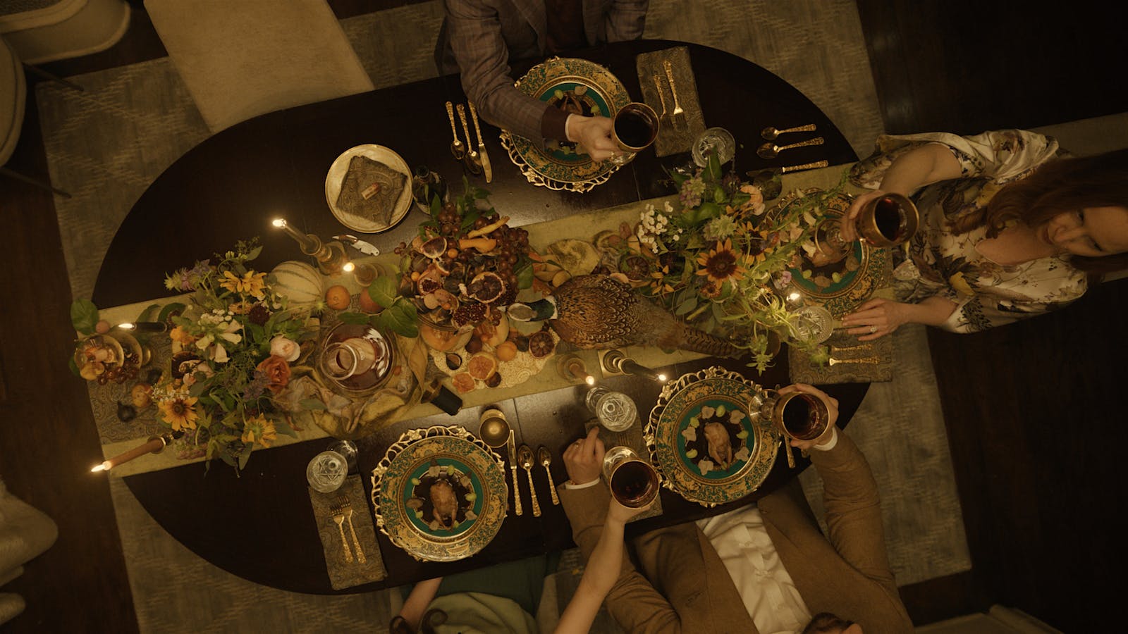  An overhead shot of a feast of hunter-style stuffed quail paired with DRC Roman&eacute;e-Conti 1978 in the season 3 finale of Servant on Apple TV.] 