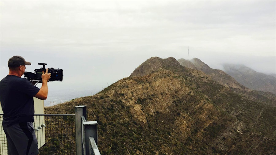 Director Robert Burks shoots a wide-angle shot of a mountain range near El Paso, Texas.