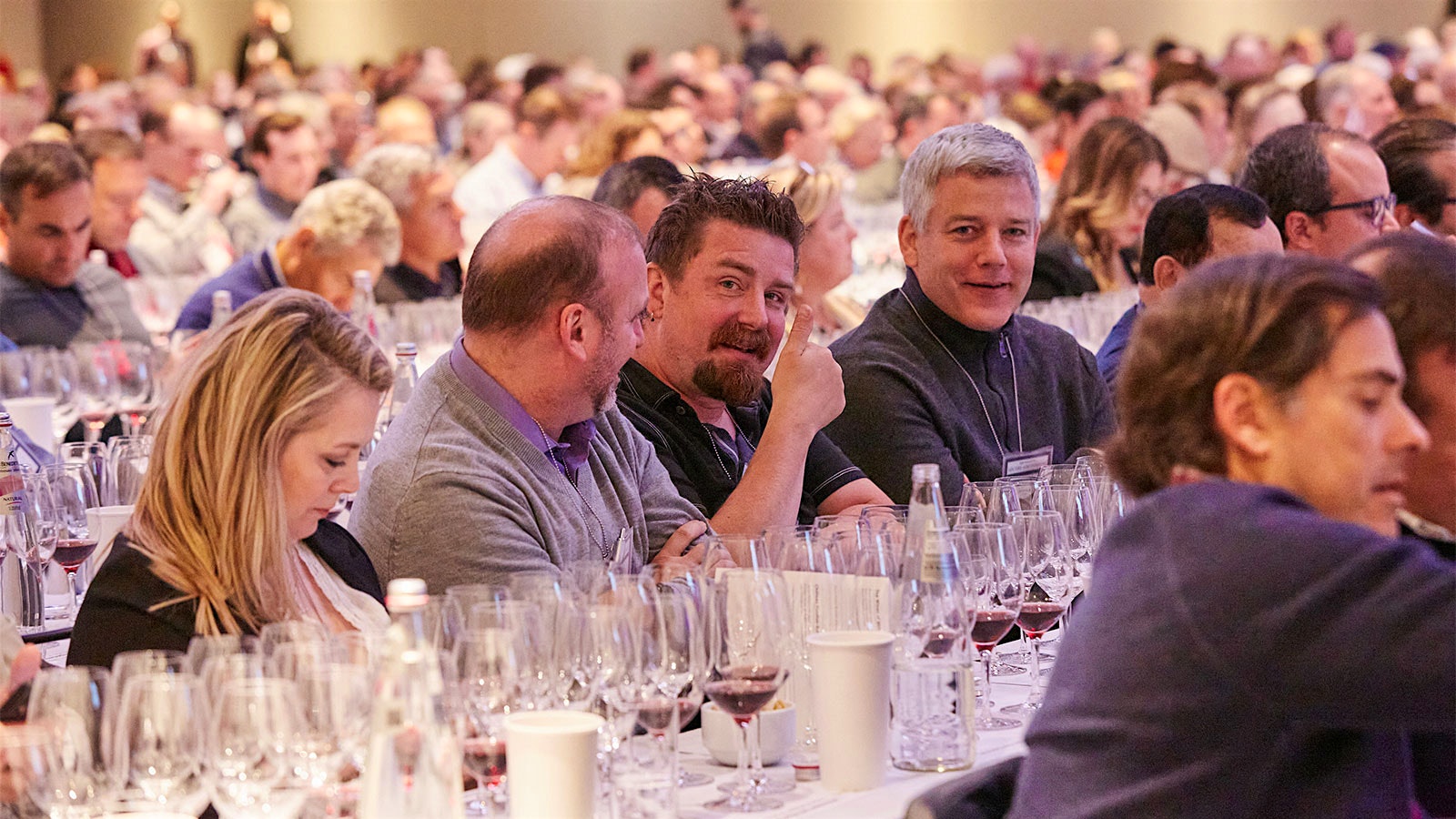  Guests enjoying the Oregon Pinot Noir seminar at the 2022 New York Wine Experience, in the NY Marriott Marquis ballroom