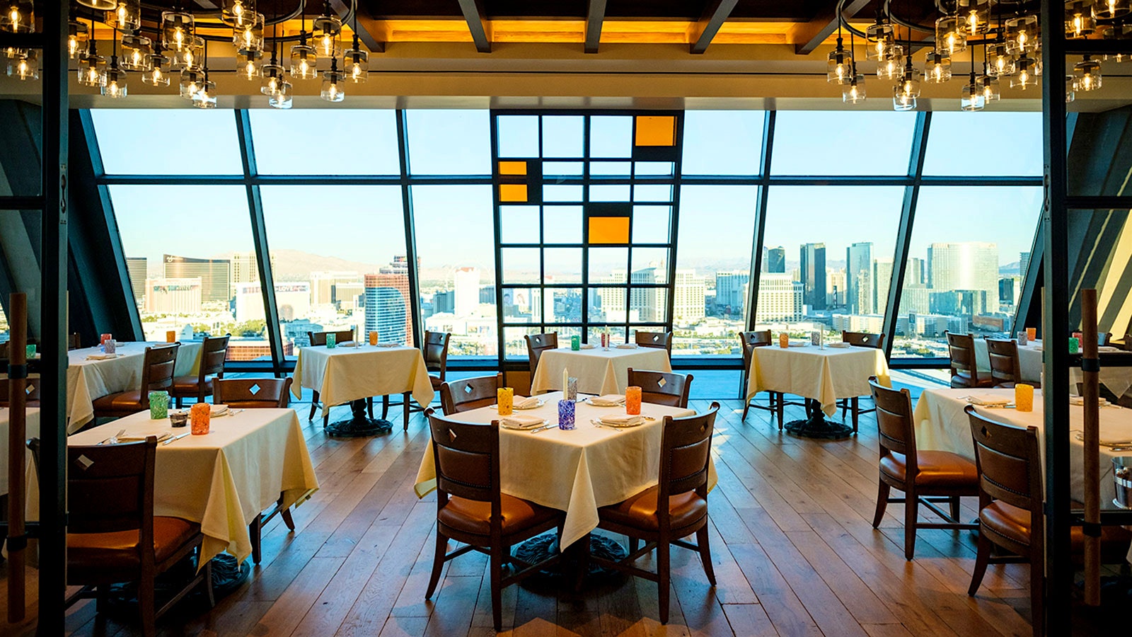  The dining room of the original Vetri Cucina, with large windows allowing views out over the city of LasVegas from the 56th floor of the Palm Casino Resort