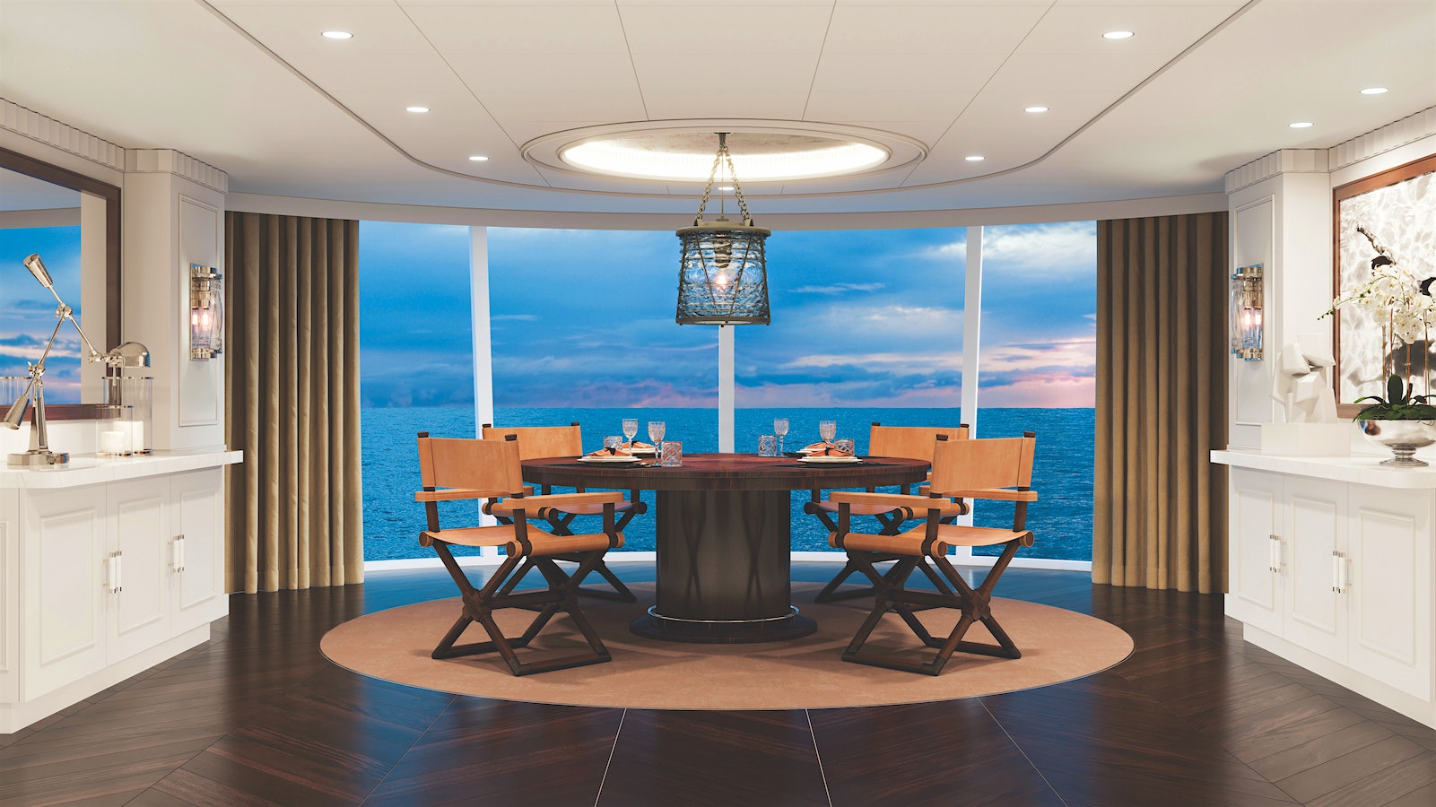  Rendering of the owners suite on the new Vista, with a dining table in front of a large ocean-view window.