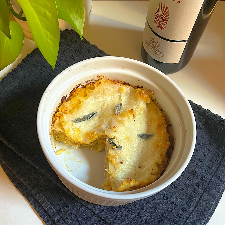 While this vegetarian dish could be paired with a richer, herb-accented white, a lighter-style red with saline and sage notes lines up well with the flavors in the food.