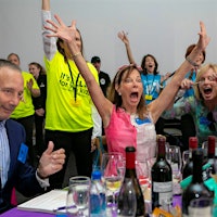 A winning bidder celebrates snagging a lot at this year's Naples Winter Wine Festival, which brought top winemakers to Southwest Florida.Naples Winter Wine Festival Raises Nearly $26 Million for Children's Causes