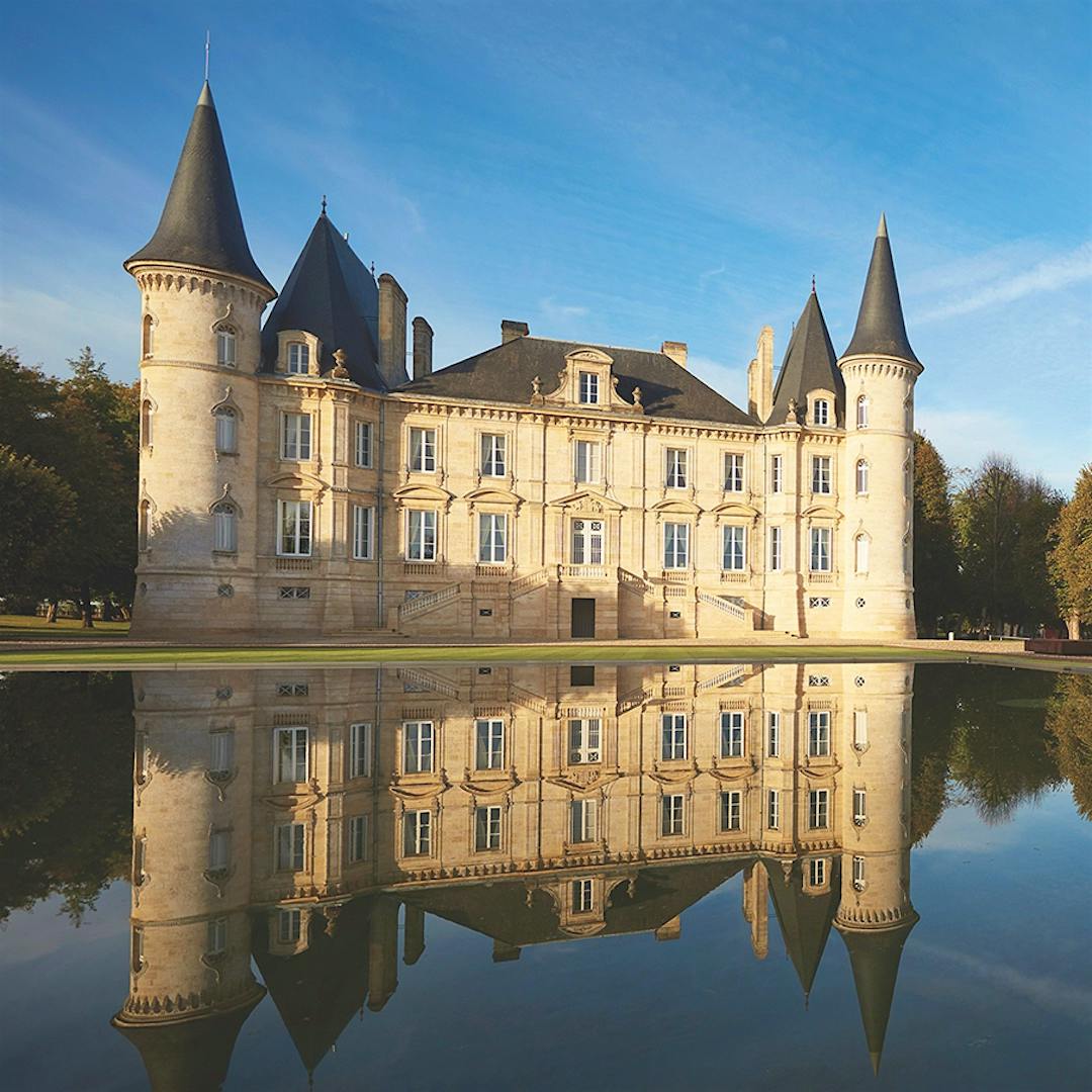 Château Pichon Baron and its reflection in a pool