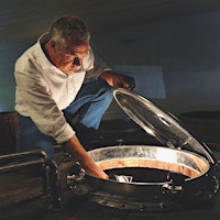 Stéphane Derenoncourt inspects fermenting must at Domaine de l'A.Stéphane Derenoncourt Can’t Miss in 2022