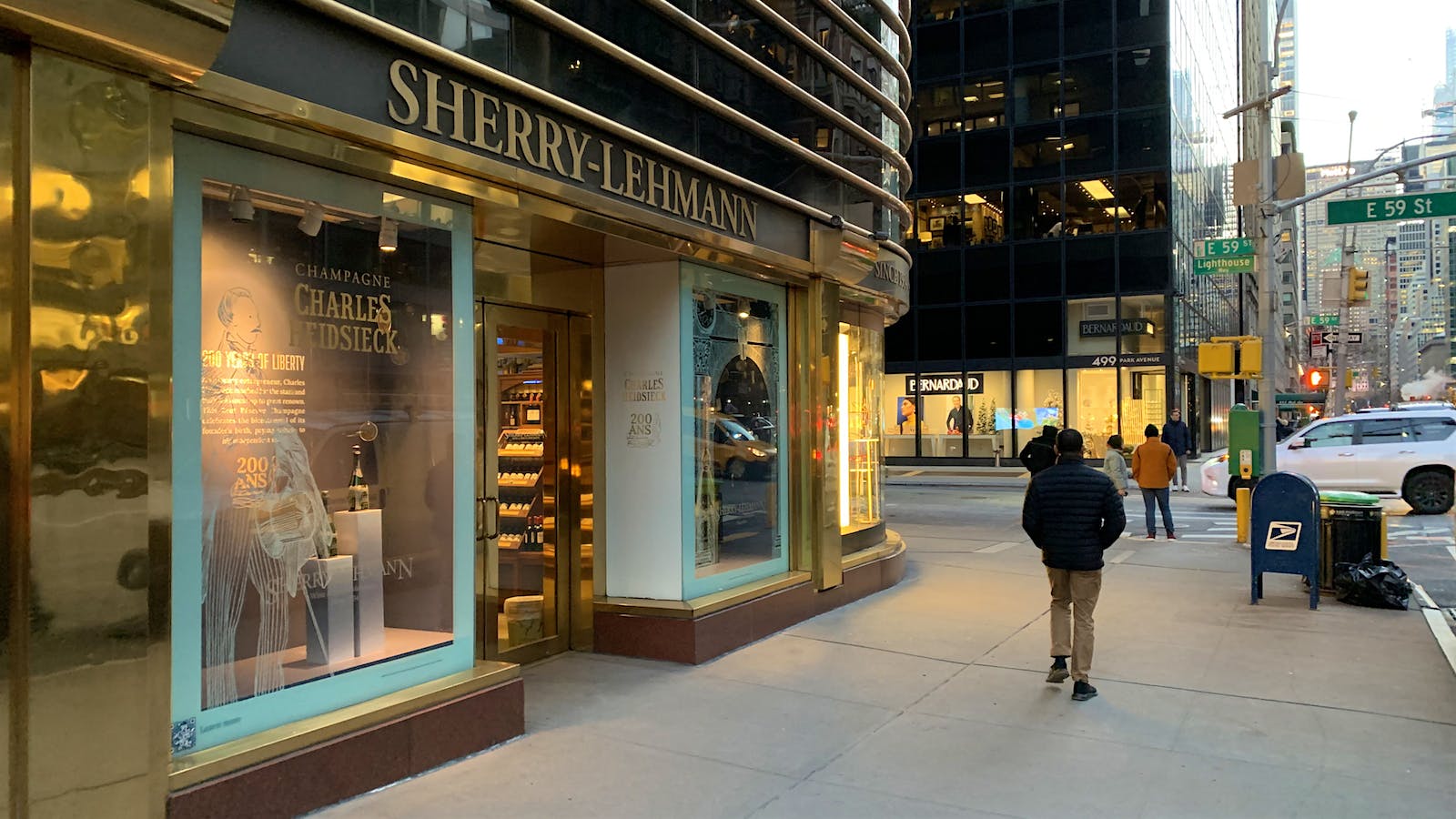 Exterior of Sherry-Lehmann store in 2023, with a pedestrian walking past