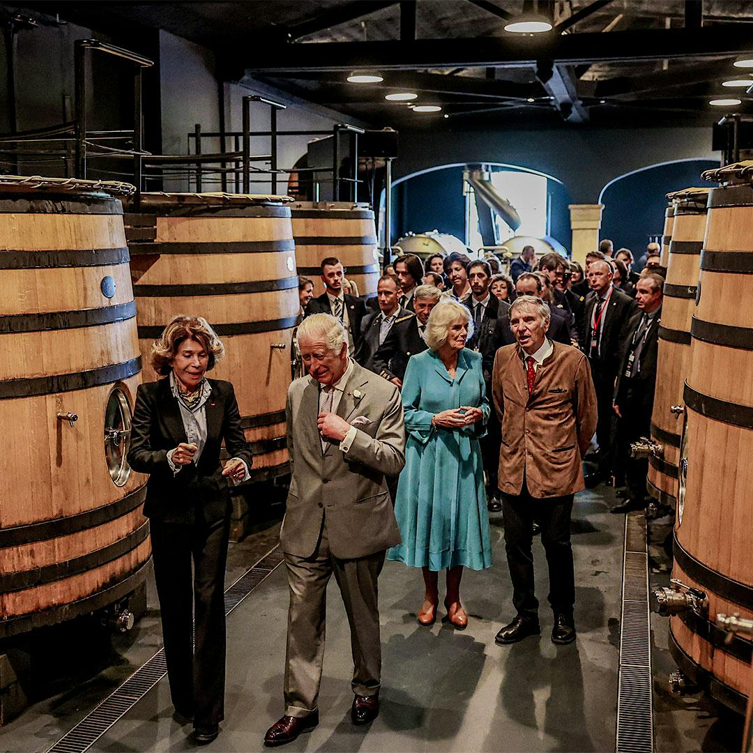 King Charles III and Queen Camilla received a tour of King Charles III and Queen Camilla were given a tour of the chai of Château Smith-Haut-Lafitte's cellars from the Cathiard family.