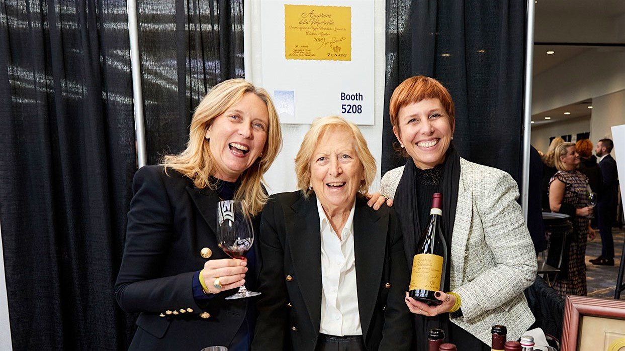  From left: Nadia and Carla Zenato, with Zenato export office manager Chiara Corsini, with their 2016 Amarone Riserva at Wine Spectator's Grand Tasting
