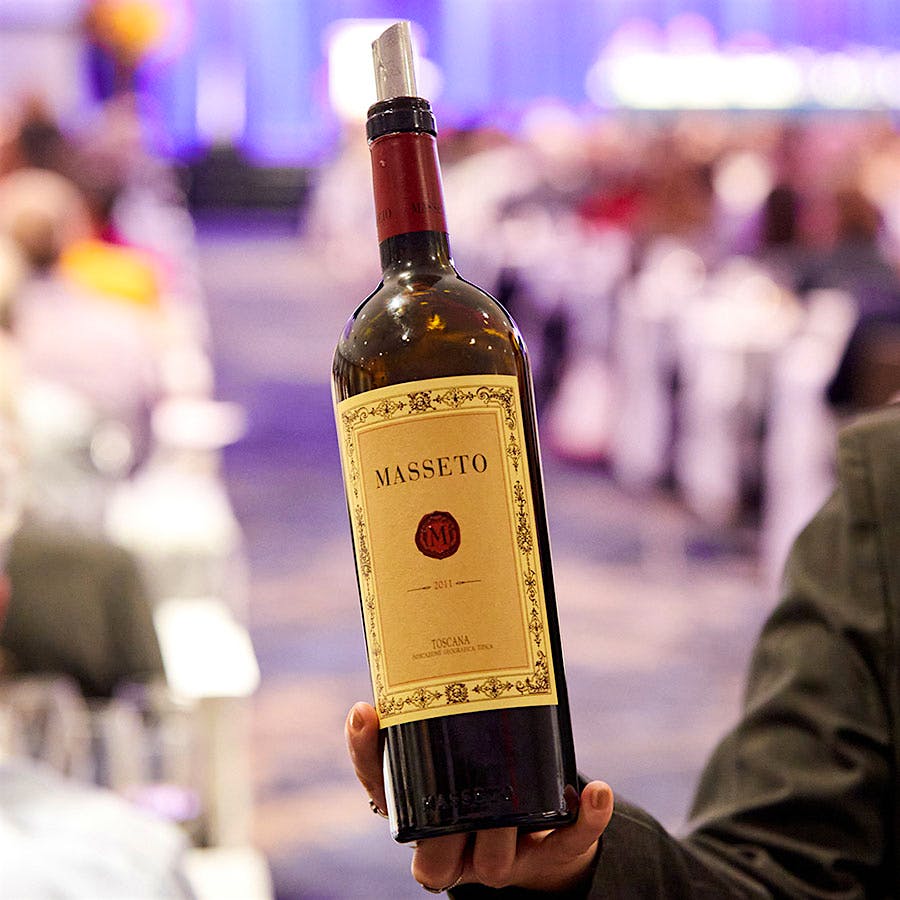  A server holding a bottle of Masseto Toscana 2011 during the New York Wine Experience
