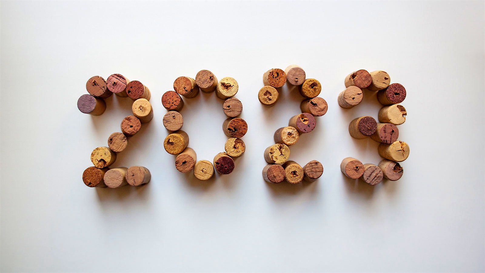  Corks are arranged to make the numbers 2023.