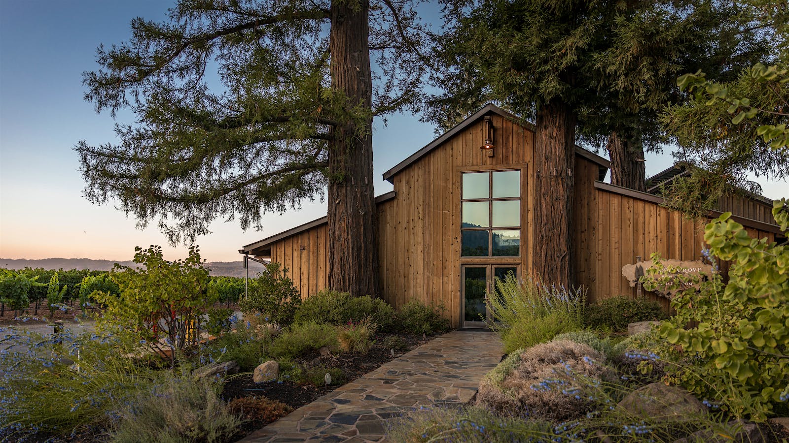 Sequoia Grove winery in Napa Valley's Rutherford AVA is surrounded by towering sequoia trees.