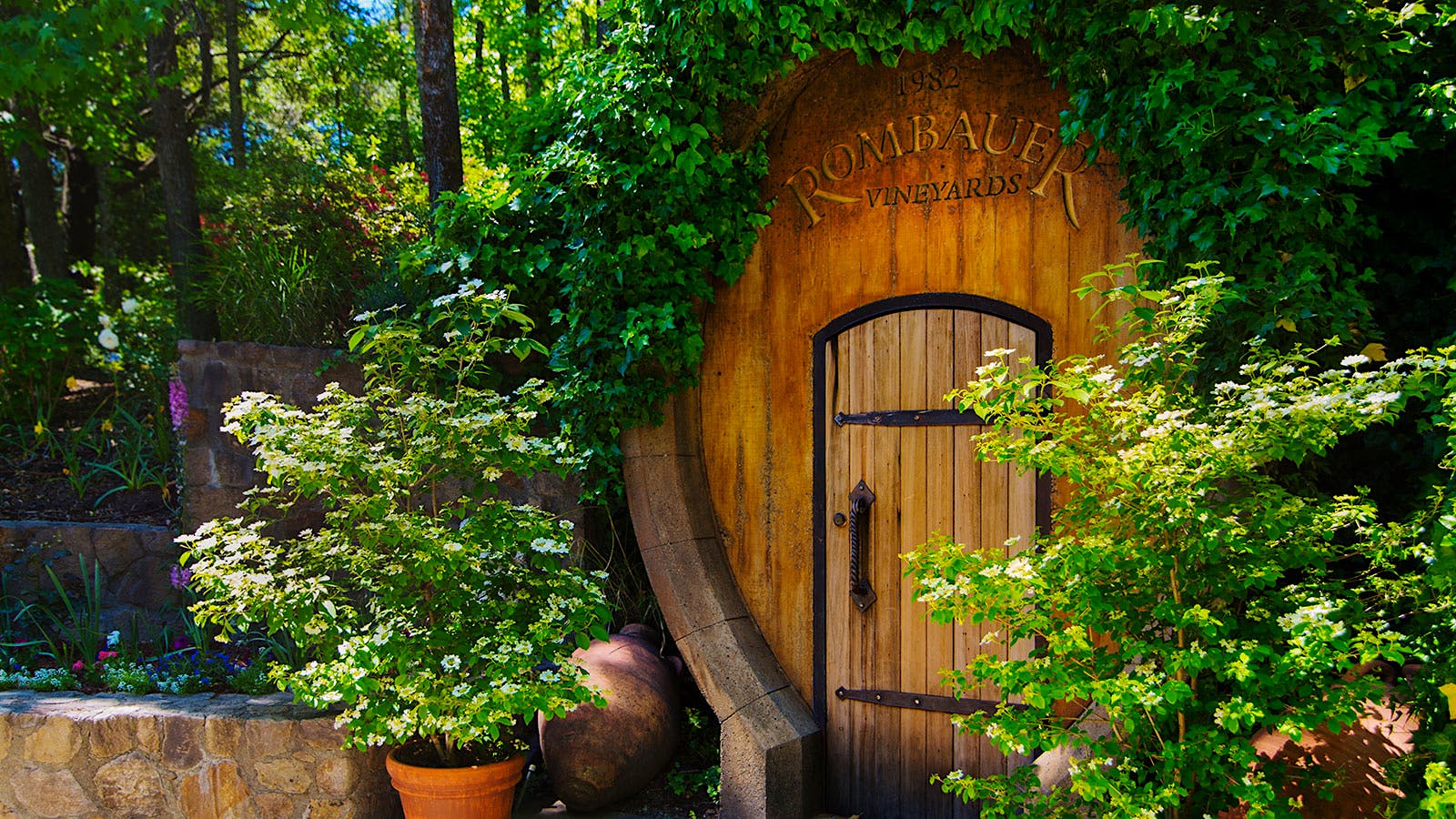 A structure made from an oak wine barrel, with a door, at Rombauer Vineyards winery in Napa Valley