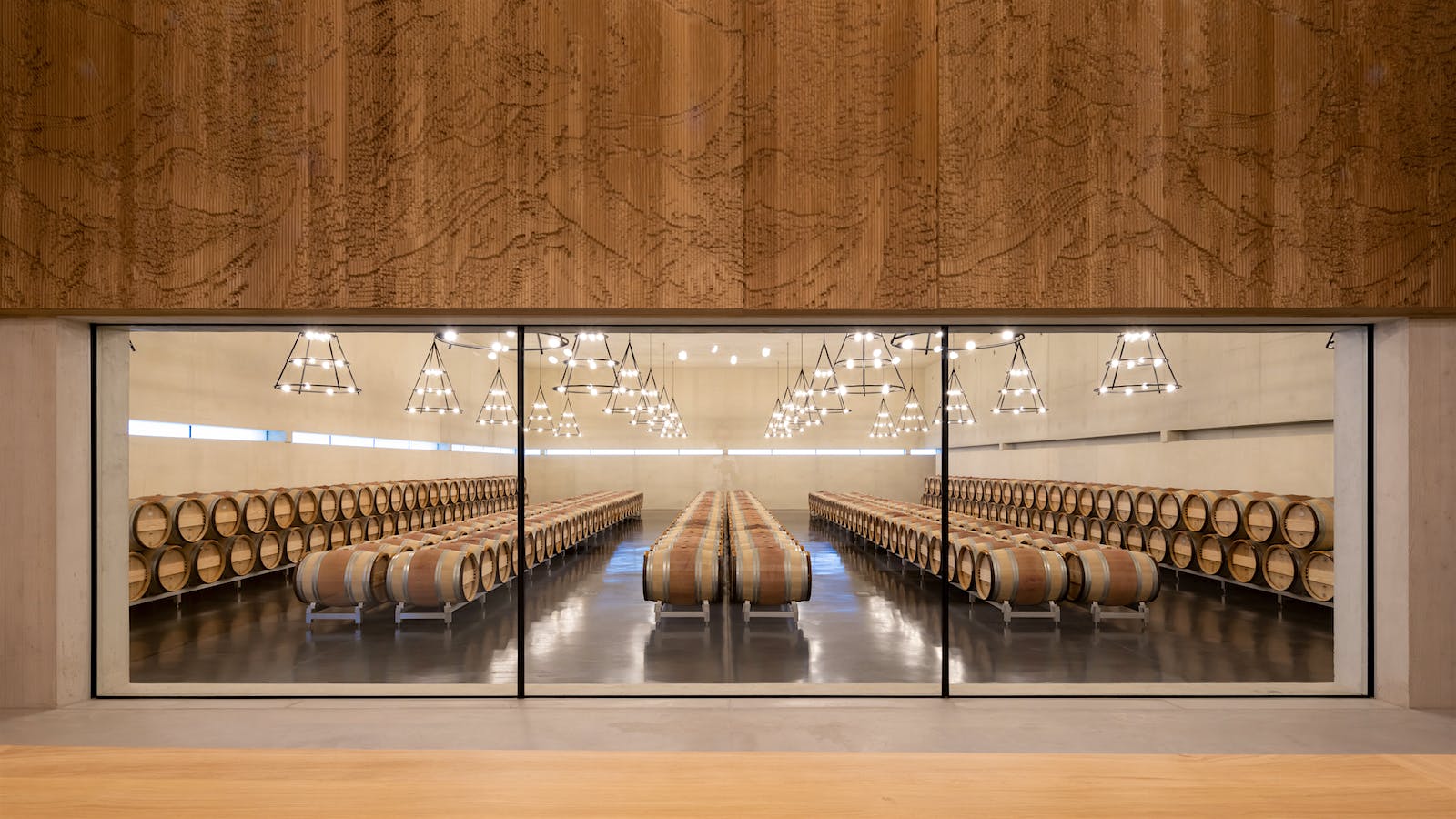 Château Bélair-Monange's wine barrel room in Bordeaux's St.-Emilion region