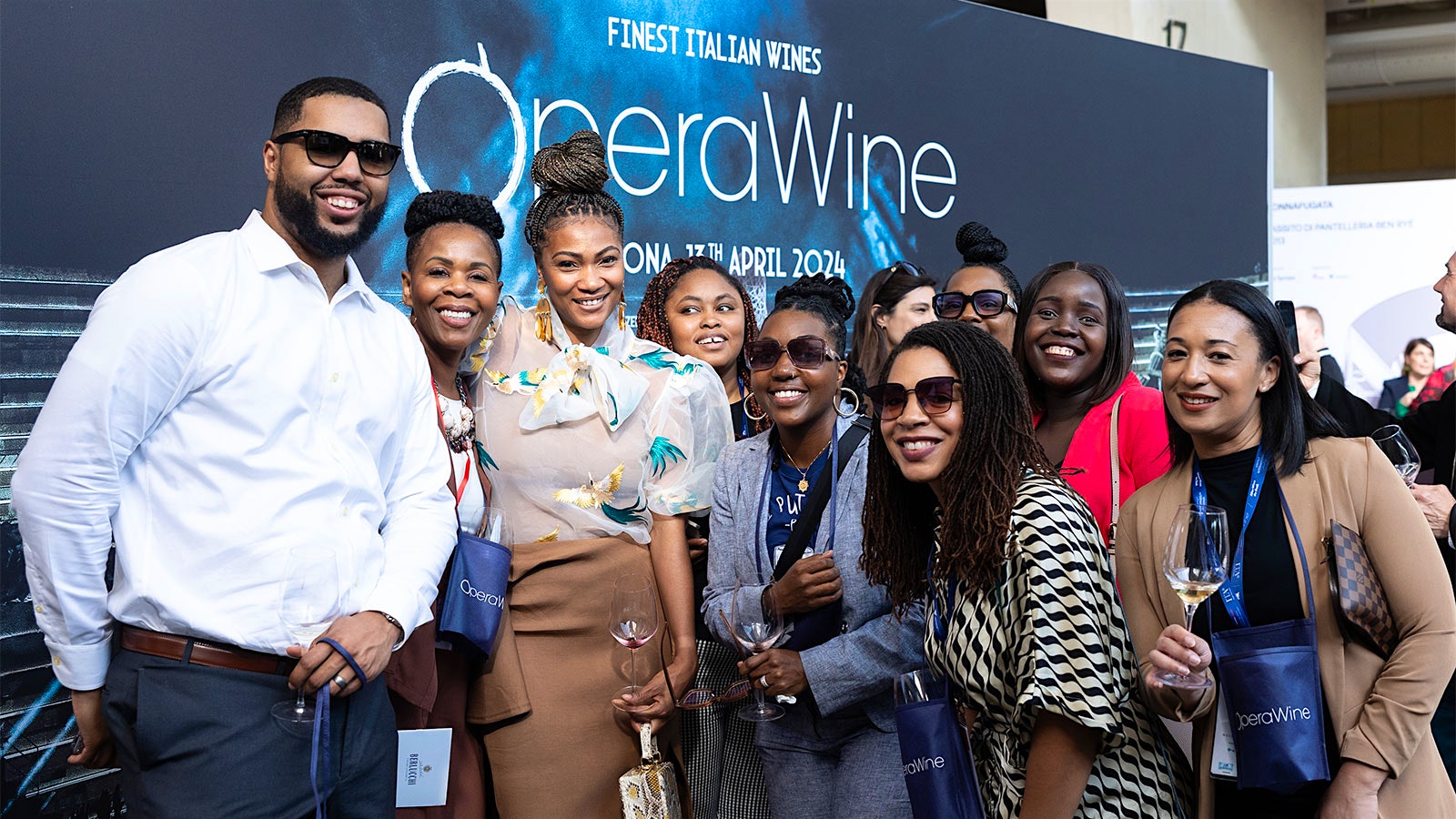  OperaWine guests pose at the entrance.